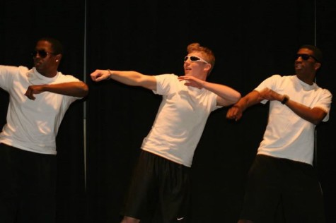 New members of Alpha Phi Delta perform onstage during Airband.