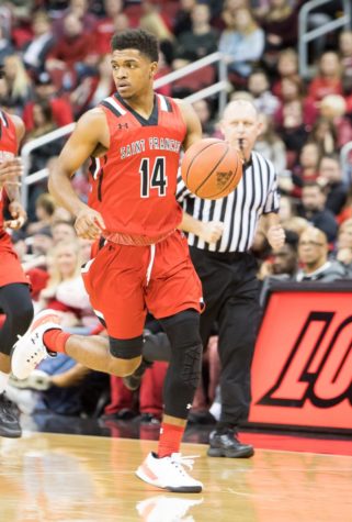 Men’s basketball hits century mark in win over American