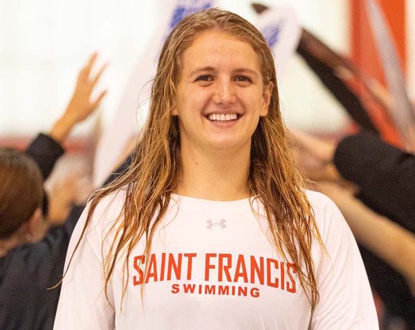 Swimming Team Preps for NEC Championships