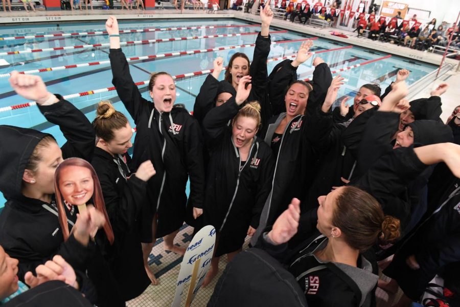 Swim Team Competing at NEC Championship