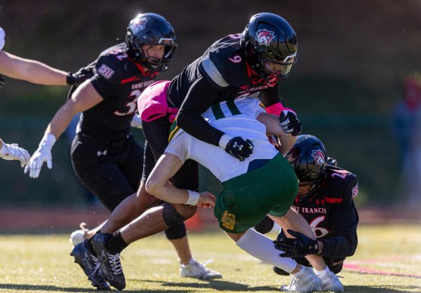 Football Makes Strides in Homecoming Game Setback